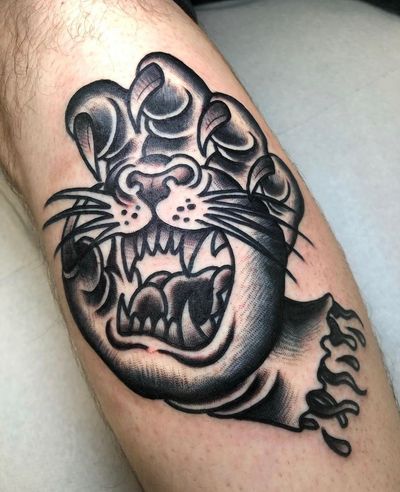 Intriguing black and gray traditional tattoo design featuring an abstract panther claw by the talented artist Angel Face.
