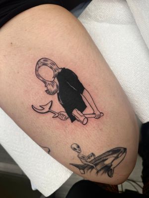 Get a sleek blackwork tattoo inspired by your favorite movie, created by the talented artist Miss Vampira. Perfect for fans of minimalist style.