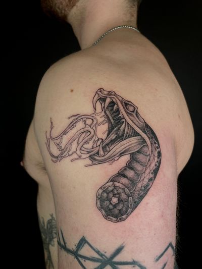 Get mesmerized by this stunning illustrative snake tattoo created by the talented artist Kat Jennings. Perfect for those who love intricate designs and symbolism.