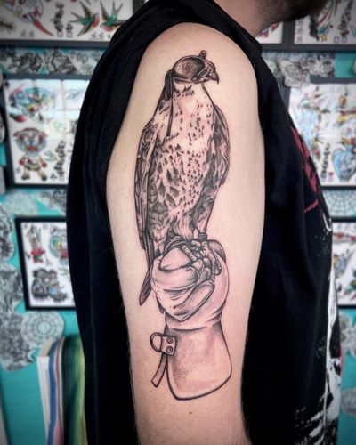 Capture the beauty of a falcon in flight expertly inked by Hannah Senoj in illustrative style.