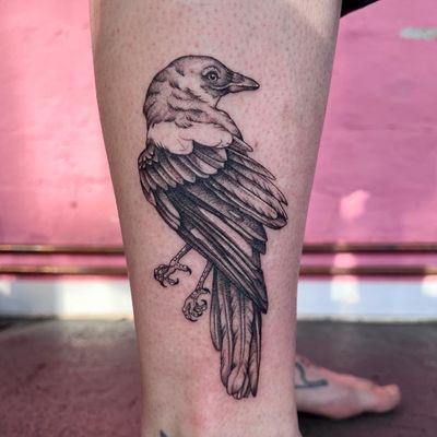 Capture the mystery and elegance of the raven with this illustrative tattoo by talented artist Hannah Senoj.