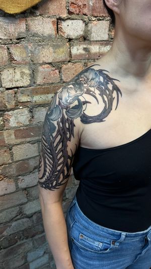 Unique blackwork and dotwork design by Misa, featuring a blend of abstract elements with floral and bone motifs.
