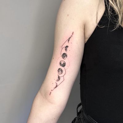 Unique dotwork and geometric design of moon phases by tattoo artist Tas Kal.