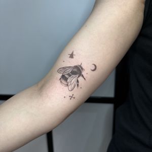 Marvel at Tas Kal's intricate dotwork and fine line style depicting a mystical moon and busy bee in perfect harmony.