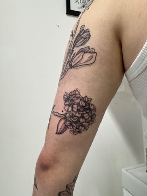 Beautifully crafted illustrative dotwork flower tattoo by Kiky Flore, perfect for those who appreciate intricate designs.