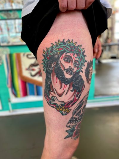 Experience the timeless beauty of a traditional Jesus tattoo by the talented artist River Tatts. Pay homage to your faith with this stunning design.