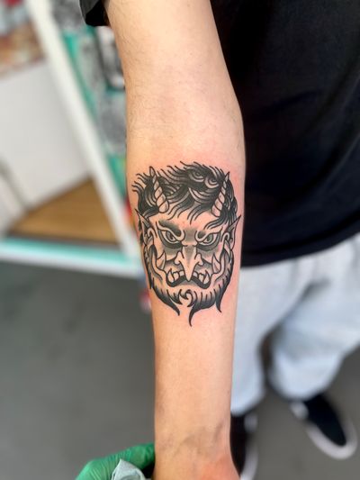 Get inked with a classic and bold traditional devil tattoo by the talented artist River Tatts. Embrace your dark side in style!
