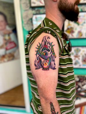 Embrace your inner wizard with this bold and classic traditional style tattoo by the talented artist River Tatts.
