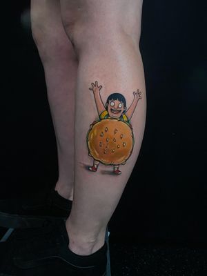 Get inked with this vibrant and playful anime-style tattoo inspired by Bob's Burgers, brought to life by artist Jethro Wood.