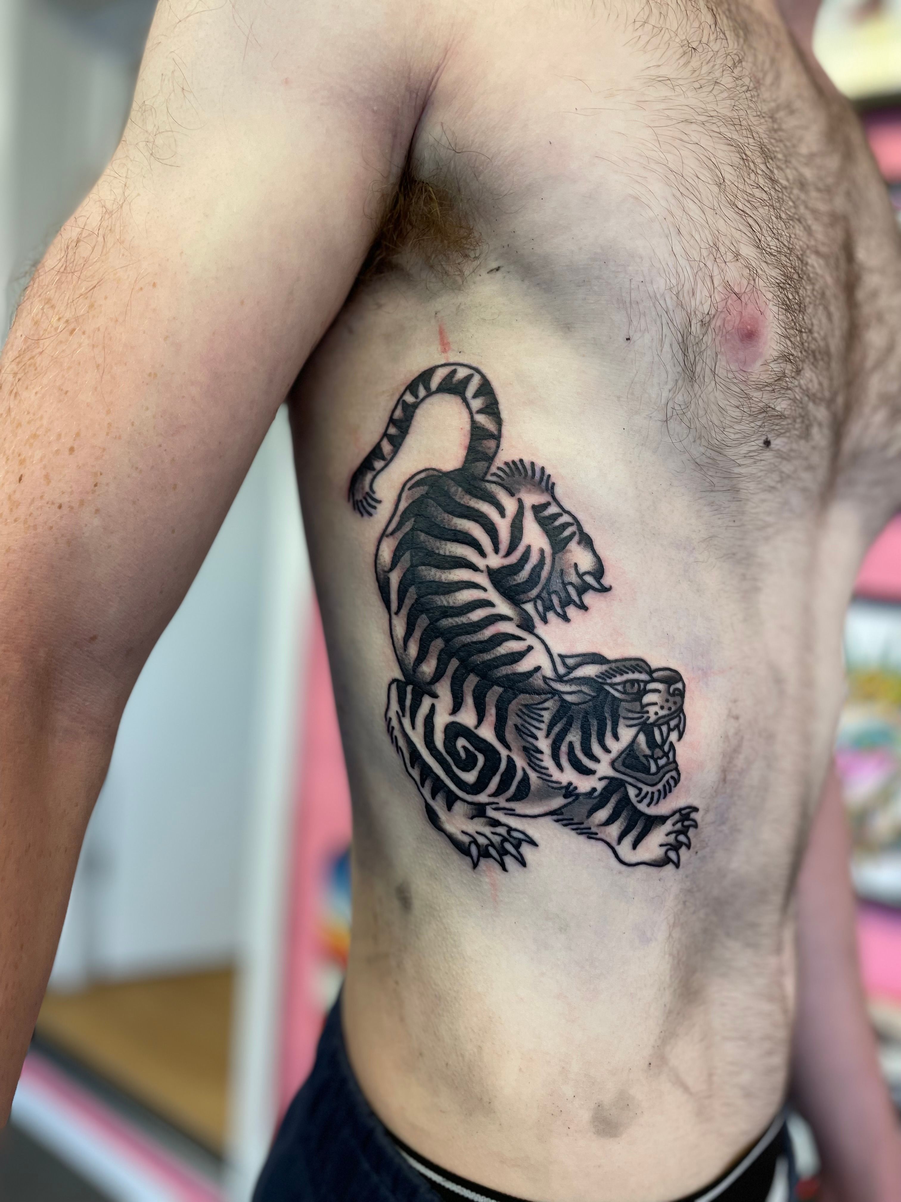 Traditional Tiger Tattoo Over Shoulder | Tiger tattoo design, Tiger tattoo,  Tiger head tattoo