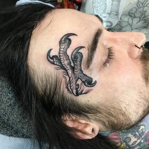 Experience the power and majesty of nature with this stunning illustrative tattoo featuring an eagle and claw design by the talented artist Jethro Wood.