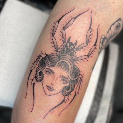Traditional style woman spider head