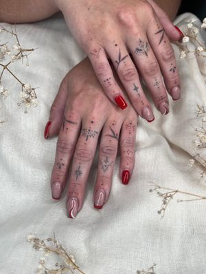 Experience the precision and beauty of hand-poked ornamental tattoos created by Abbie Lou in stunning dotwork style.