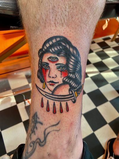 Get chills down your spine with this haunting traditional tattoo of a horror lady by flashbyaj. Perfect for fans of horror and classic tattoo styles.