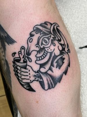 Get inked with a wickedly cool tattoo of a goblin done in classic traditional style by the skilled artists at Goblyn Crew.