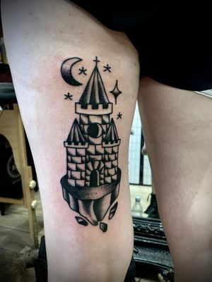 Experience the timeless beauty of a traditional castle tattoo by the talented Goblyn Crew. Let your skin tell a story of history and heritage.