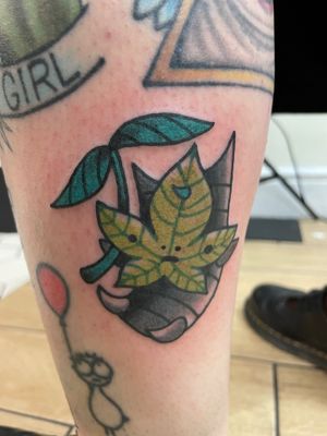 Get a timeless and classic maple leaf tattoo in illustrative style by Goblyn Crew. Perfect for nature lovers!