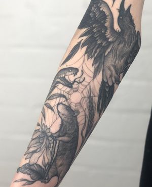 Illustrative tattoo by Claudia Smith featuring a snake, crow, raven, spider, mouse, rat, and web motif.
