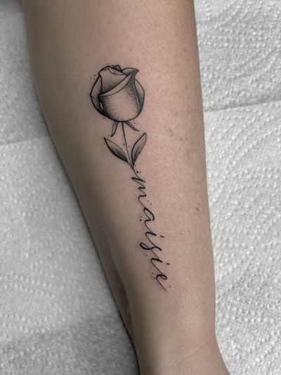 Exquisite dotwork and fine line rose design with small lettering, illustrated by the talented artist DVA.