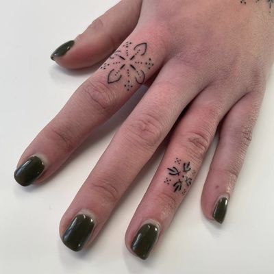 Elegant ornamental tattoo design featuring intricate patterns created by DVA. Perfect for those seeking a unique and sophisticated tattoo.