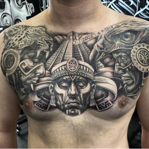 Get inked with a detailed and captivating black and gray Astek and Mayan design by tattoo artist Sam Waiting.