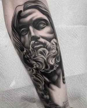 Capture the beauty of a statue with this detailed and realistic black and gray tattoo by artist Sam Waiting.