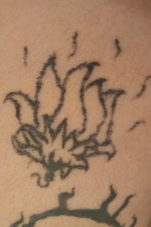 Upper left leg did these stick and poke for ex that used me broke up with me lied all the time stick and poke did myself