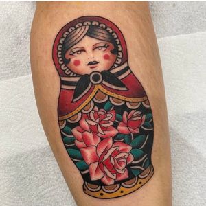 Get a timeless piece of art with this traditional matryoshka doll tattoo by talented artist Sam Waiting. Colorful and detailed, this tattoo is sure to make a statement.