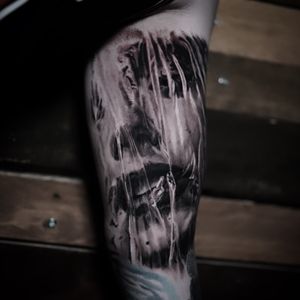 Stunning black and gray tattoo of a plastic woman, expertly done by Milan Boros