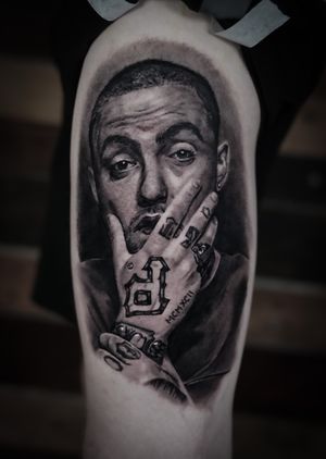 Get a stunning black and gray tattoo of Mac Miller by the talented artist Milan Boros.