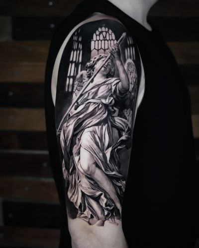 Capture the ethereal beauty of an angelic statue with this stunning black and gray realism piece by artist Milan Boros.