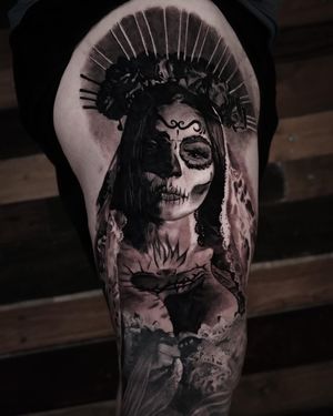 Get mesmerized by Milan Boros' black and gray realism tattoo of a stunning Katrina woman