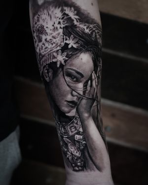 Experience exquisite black and gray realism by Milan Boros in this captivating geisha portrait tattoo.