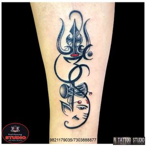 Trishul with Om and lord Ganesha tattoo..#lord #lordganesha #ganesha #vighnaharta #mahadev  #shiv  #trishul #rudraksha #mahakal #damru #trishultattoo #mahadevtattoo #om #tattoo #tattooed #tattooing #tattooidea #tattooideas #tattoogallery #artist #artwork #rtattoo #rtattoos #rtattoostudio #ghatkopar #ghatkoparwest #mumbai #india