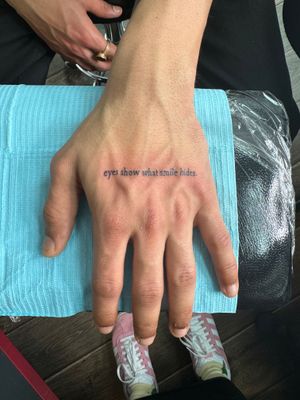 Small lettering tattoo by Kiky Flore, expressing heartfelt sentiments in a subtle and elegant way.