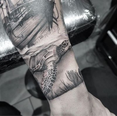 Admire the intricate details of this stunning black and gray turtle tattoo by Tom Boxell. Dive into the world of realism.