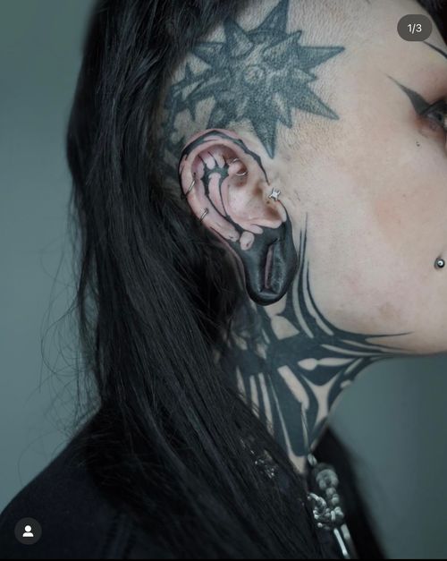 Geometric head tattoo