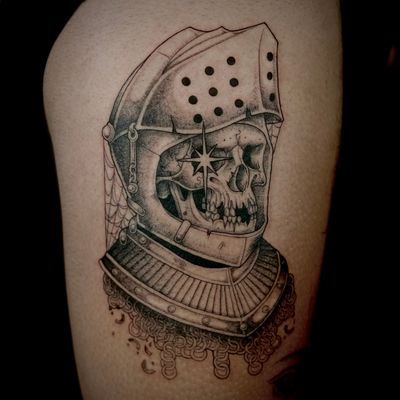 Get inked by the talented Kat Jennings with a unique design featuring a knight skull in a detailed helmet.
