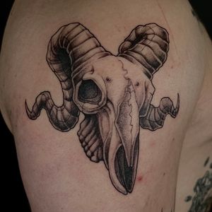 Bring a touch of dark beauty to your skin with this skull tattoo by renowned artist Kat Jennings. Detailed and striking, it's sure to make a statement.