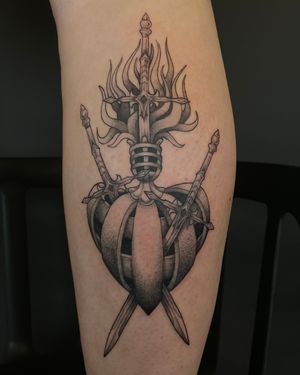 Get inked with a stunning illustrative design by the talented Kat Jennings, featuring a sword and sacred heart motif. Express your strength and love with this unique tattoo.