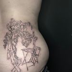 Unique fine line and illustrative tattoo featuring architecture, a chair, and a table by Emily Bonnet.