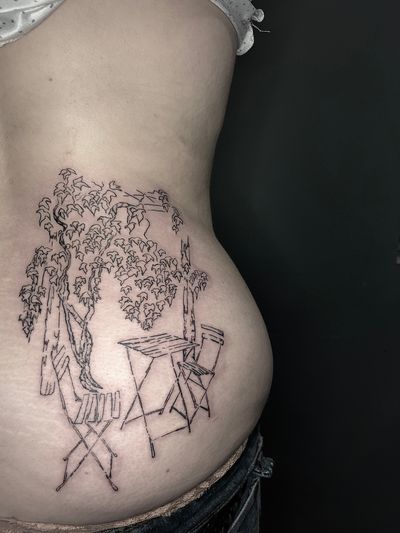 Unique fine line and illustrative tattoo featuring architecture, a chair, and a table by Emily Bonnet.