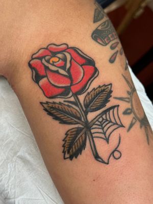 Experience the timeless beauty of a traditional rose tattoo crafted by the talented artist Jakob Isaac. Perfect for lovers of classic tattoo styles.