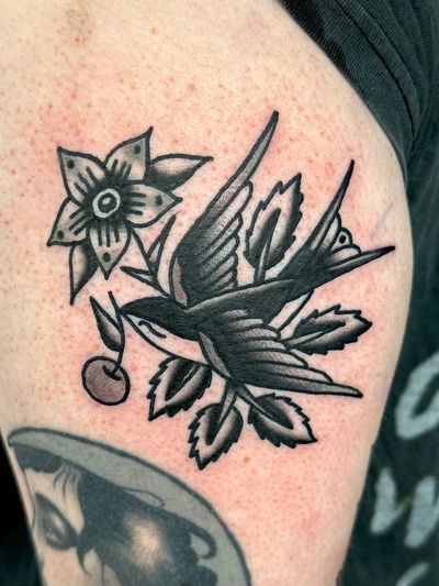 Get a timeless piece of art with this traditional swallow tattoo by skilled artist Jakob Isaac. Symbolizing loyalty and freedom, this design will stand the test of time.