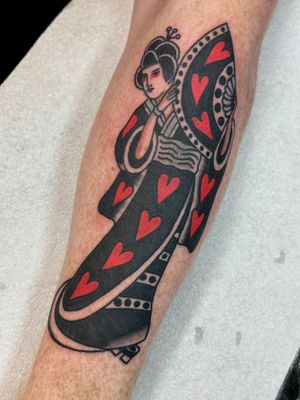 Experience the timeless beauty of a traditional geisha tattoo masterfully executed by renowned artist Jakob Isaac.