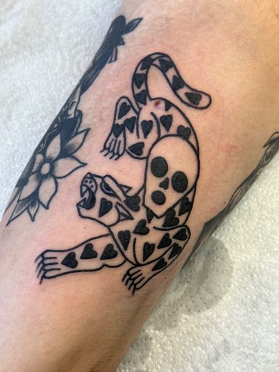 Get a fierce yet tender traditional panther and heart tattoo by renowned artist Jakob Isaac.