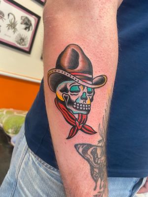 Get inked with this cool traditional tattoo featuring a skull and cowboy motif by flashbyaj. Perfect for fans of Western themes!