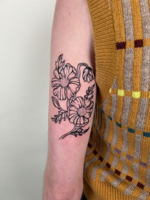 Get a stunning illustrative flower tattoo by the talented artist Jack Howard. Beautiful and unique design guaranteed to stand out!