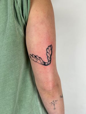 Fly high with this stunning illustrative wings tattoo design by the talented artist, Jack Howard.