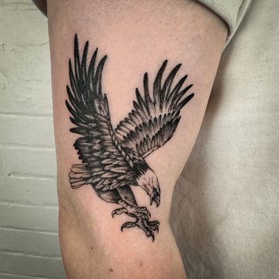 Get a stunning illustrative eagle tattoo designed by the talented artist, Jenny Dubet, to showcase your strength and freedom.